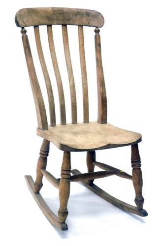 An ash and elm lath back rocking chair, of small proportion, 87cm high.