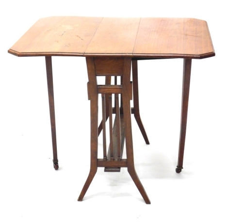 An Edwardian Sutherland gate leg table, with canted top, on sabre stiles, when closed 62cm high, 61cm wide, 19cm deep.