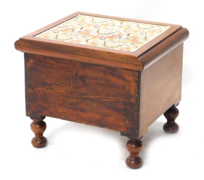 A Victorian flame mahogany commode, with embroidered top and fitted interior for scraps, on inverted double bun feet, 40cm high, 42cm wide, 39cm deep.