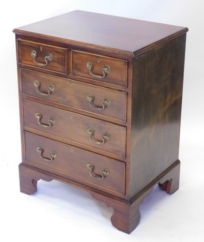 A 20thC mahogany chest, with two short and three long cock beaded drawers, on bracket feet, 73cm high, 58cm wide, 41cm deep.