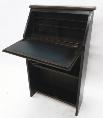 An early 20thC bureau, of small proportion, with open bookcase, the fall revealing a fitted interior, on stiles, 100cm high, 61cm wide, 21cm deep. - 2