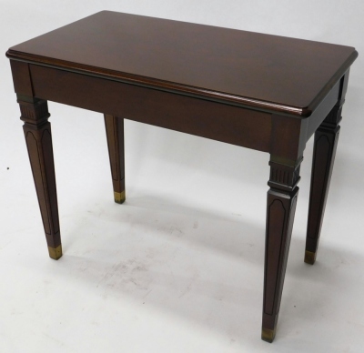 A modern mahogany piano stool, of rectangular form with hinged lid and vacant interior, on square tapering legs, 57cm high, 65cm wide, 39cm deep. - 2