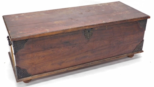An eastern 19thC pine blanket box, with pierced metal mounts, large hole cut to side (A/F) 50cm high, 138cm wide, 59cm deep.