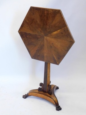 A 19thC mahogany and yew wood specimen table, the hexagonal top inlaid with various sections, on a turned stem and platform base terminating in hairy paw feet, the top 69cm wide. - 2