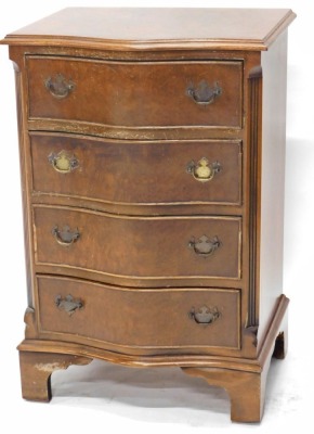 A 20thC serpentine walnut chest of four long drawers, on bracket feet, of small proportion, 76cm high, 47cm wide, 38cm deep.