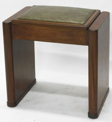 A mid 20thC walnut Art Deco piano stool, with overstuffed seat in shagreen style material, on oblong stiles, 53cm high, 51cm wide, 31cm deep.