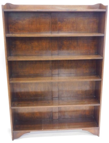 A 20thC oak freestanding bookcase, with three part galleried top, six shelves, 160cm high, 105cm wide, 26cm deep.