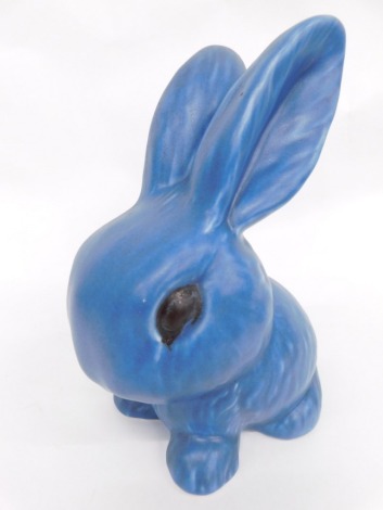 A 20thC Sylvac pottery blue rabbit, no. 1027, marked beneath, 23cm high.