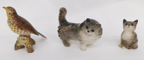 A Beswick kitten, in grey colour way, further cat and song thrush, 15cm high, printed marks beneath. (3)