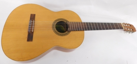 A BM Spanish Concert acoustic guitar, 99cm long with outer leather finished carry case.