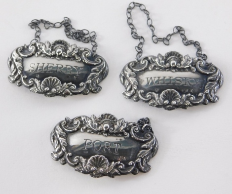 Three George V silver decanter labels, for sherry, port and whiskey, London 1931, 0.86oz.