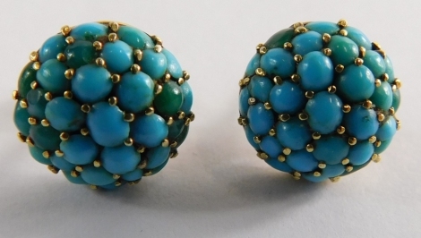 A pair of turquoise stud earrings, each set with round brilliant cut stones in claw setting, with single pin back, with butterfly backs, 1.9g all in.