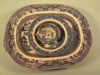 A 19thC blue printed meat dish decorated with deer within a oriental landscape