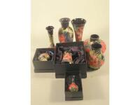 Eight various Moorcroft style vases