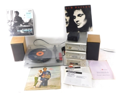 A Denon CDR-M30 stacking system, in three sections, with two speakers, and a Pro-ject turntable, in Perspex case, 45cm wide and a small quantity of record sleeves etc.