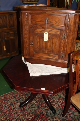 Modern octagonal occasional table and a J C low corner unit.