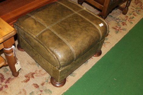 A G-Plan TV video cabinet and a leather upholstered stool.