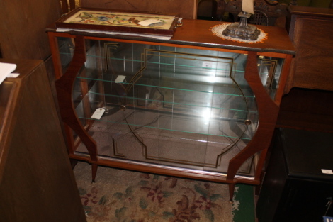 A Retro 1970s china cabinet.