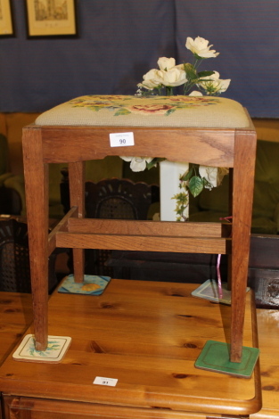 An oak stool, with tapestry seat.