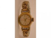 A Perfex lady's wrist watch in gold plated case