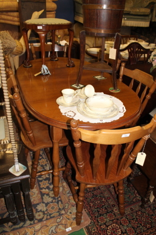 A modern dining table and six chairs.