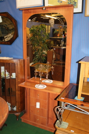 A reproduction mirrored hall stand.