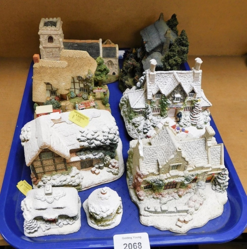 A group of Lilliput Lane Cottages, to include Calling Home for