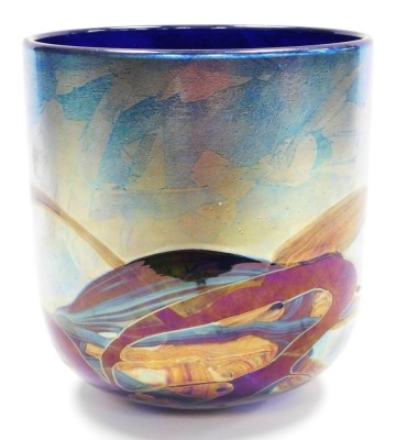 A Michael Harris Isle of Wight glass 'Nightscape' vase, of cylindrical form, decorated with iridescent trails against a blue ground, with paper label and signed to underside, 21cm high, 20cm diameter. - 2