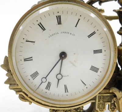 A late 19thC Howell, James and Company of Paris brass cased clock and barometer, the clock with circular enamel dial bearing Roman numerals, with complimentary barometer dial, flanking a thermometer, the case of double barrel form, with central carrying h - 2