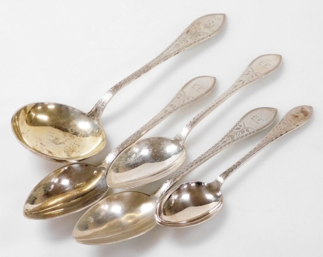 A group of Meyer and other Danish silver and plated table flatware, foliate engraved, shield terminal with engraved monograms, comprising a Christian Heise ladle, three Meyer table spoons, and a plated dessert spoon, 8.78oz silver.