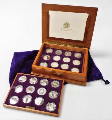 A Royal Mint Elizabeth II Golden Jubilee silver proof coin collection, the fitted case containing twenty four silver coins with the Queen's portrait highlighted in 22ct gold, no. 2994, sold with certificates and presentation booklet, with purple velvet dr