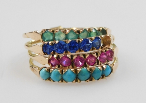 A four band interlinked ring, set with turquoises and three colours of gem stones, set in yellow metal, indistinctly marked, one stone lacking, size O/P, 4.2g.