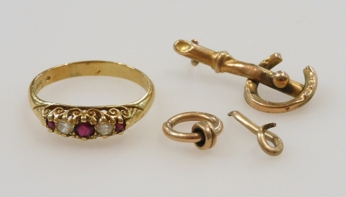 An 18ct gold ruby and diamond five stone ring, size N, 3.0g, a 9ct gold loop attachment, 0.7g, and two pieces of broken jewellery, possibly gold, 0.7g.