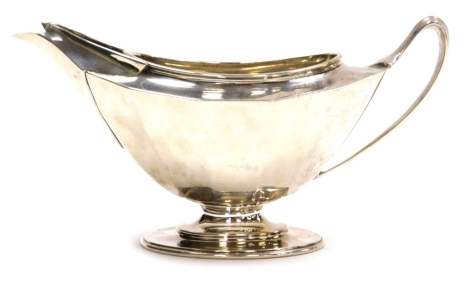 A George V silver boat shaped cream jug, Harrison Brothers & Howson (George Howson), Sheffield 1921, 6oz, 8.5cm high.