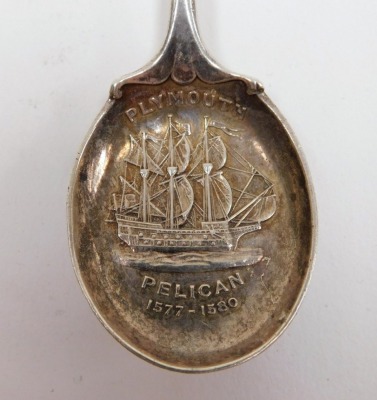 A group of small silver, comprising an Edward VII silver mustard pot, part fluted with blue glass liner, William Neal, Chester 1902, together with a salt spoon, two mustard spoons and a Victorian souvenir spoon commemorating the Pelican ship 1577-1589, we - 3