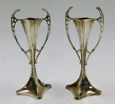 A pair of Edward VII Art Nouveau silver bud vases, of twin handled waisted form, loaded, Williams (Birmingham) Ltd, Birmingham 1908, 15cm high, together with a silver backed Art Nouveau style hair brush embossed with flowers, Birmingham 1886. - 4