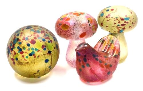 Four Isle of Wight glass 'Summer Fruits' paperweights, designed by Timothy and Jonathan Harris, comprising a mushroom, 6cm high, and a globular paperweight, 5cm, each in the goldberry colourway, and a bird, 4cm high, and a mushroom, 6cm high, each in the