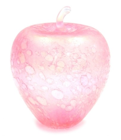 A pink iridescent glass apple, possibly by John Ditchfield, unsigned, 16cm high.