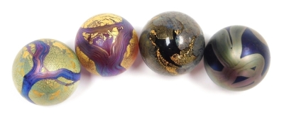 Four Isle of Wight glass orb paperweights, comprising a pair of purple paperweights with trailing decoration, gilt heightened, and two further paperweights, each with paper labels, 4.5cm high, boxed. - 2