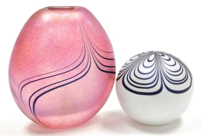 Two pieces of Glasform glass, comprising a paperweight with purple petal decoration against a white ground, 6.5cm high, and an iridescent pink vase of compressed form with trailing decoration, 11cm high, each signed Glasform to base. - 2