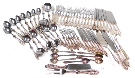 A suite of Christoph Widman flatware, each piece with a silver plated handle, formed as a leaf with a pierced centre, marked W90, with steel prongs, blades and bowls, to include soup spoons, dessert spoons, teaspoons, dessert knives and forks, etc. (1 tra