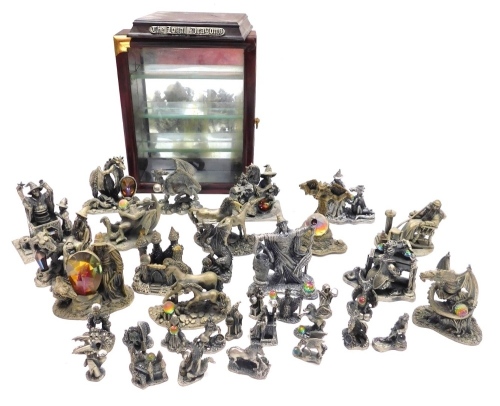 A group of Tudor Mint Myth and Magic figures, to include Old Father Time, The Majestic Dragon, The Wizard of The Serpents, The Crystal Serpent, etc., together with a display case.