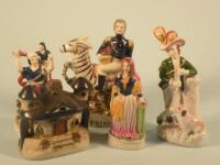 Four reproduction Staffordshire figures to include figure on horseback