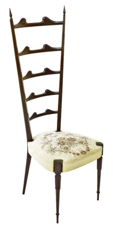 A mid century ladder back dining chair, possibly Chiavari, with a floral embroidered seat, raised on turned tapering front legs, 131cm high. (AF)