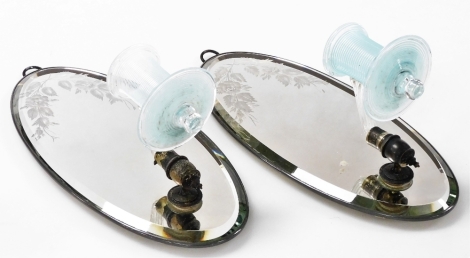 A pair of late Victorian oval glass girandoles, possibly Stourbridge, of oval bevelled form, engraved to the top with rises, with fluted and turquoise blue ribbed glass arms, 30cm high.