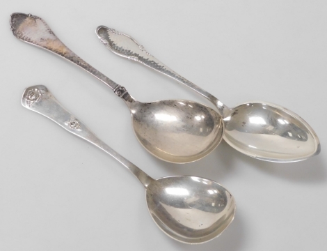 Three Danish silver table or fruit spoons, two with hammered decoration, the other embossed with roses, by Christian Heise and Johannes Siggaard, 5.39oz.