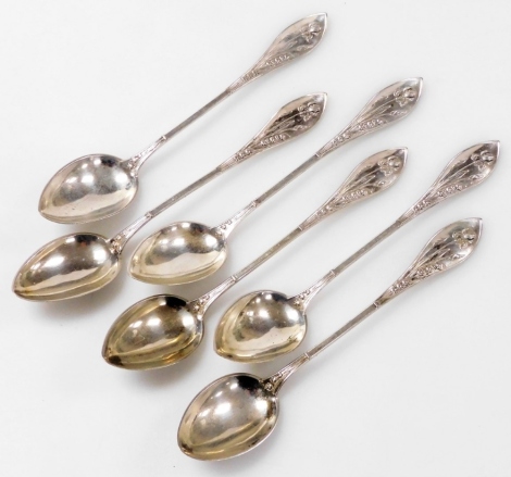 A set of six Norwegian silver coffee spoons, each handle embossed with irises and lily of the valley, stamped 11 lodigt, 1.8oz.