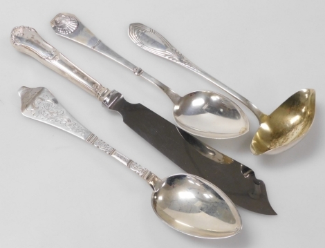 A group of Danish silver, comprising two silver dessert spoons, one with a scalloped shell terminal, the other foliate engraved, both by Christian F Heise, together with a Meyer silver and gilt cream ladle, 4.82oz, together with a silver handled fish knif