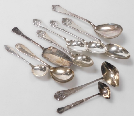 A group of Danish silver plated flatware, to include serving spoons, preserve spoons, cream ladles, etc., each handle of varying design.