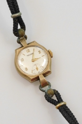 A Rotary lady's 9ct gold cased wristwatch, the circular silvered dial with engine turned decoration, subsidiary seconds dial, on a leather strap.